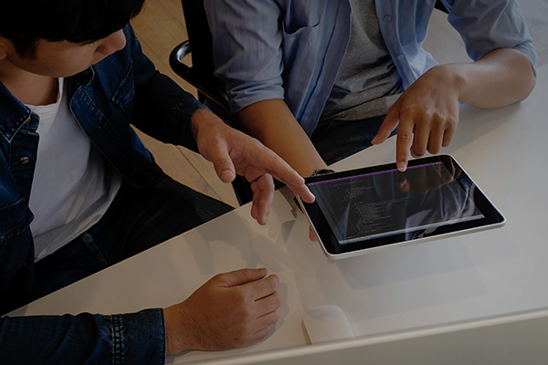 People using mobile tablet device