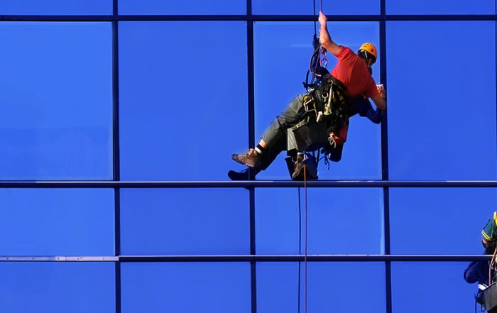 Men cleaning windows