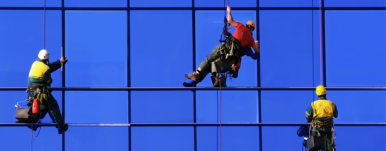 Men cleaning windows