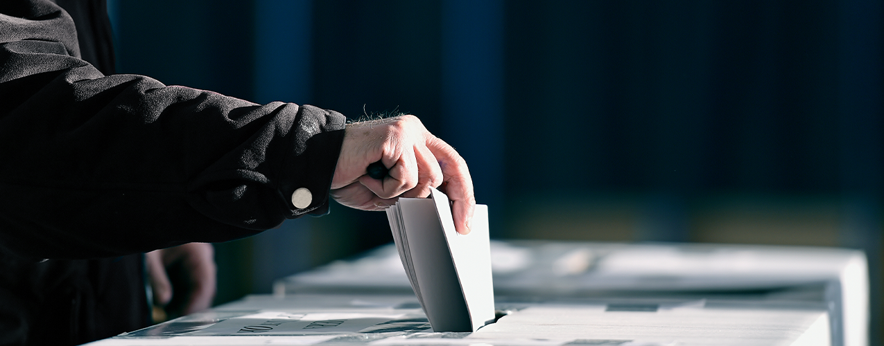 Voter at ballot box