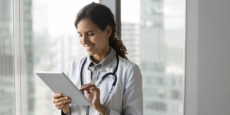 Doctor on tablet