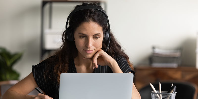 Woman attending online webinar