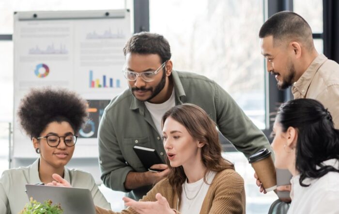 Five people collaborating on a community information platform