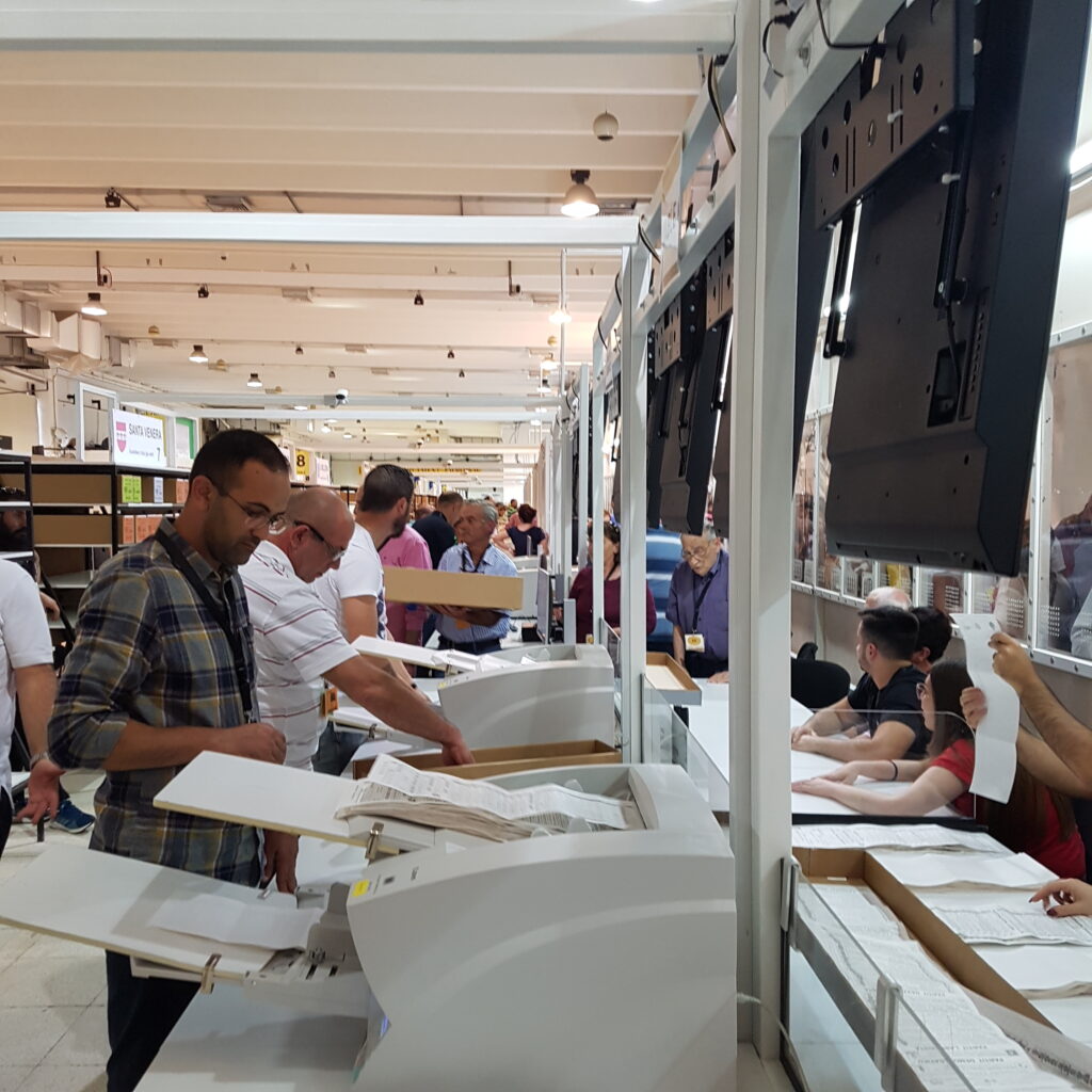 Idox Electoral Managed Services eCount team scanning ballot papers during Malta elections count process