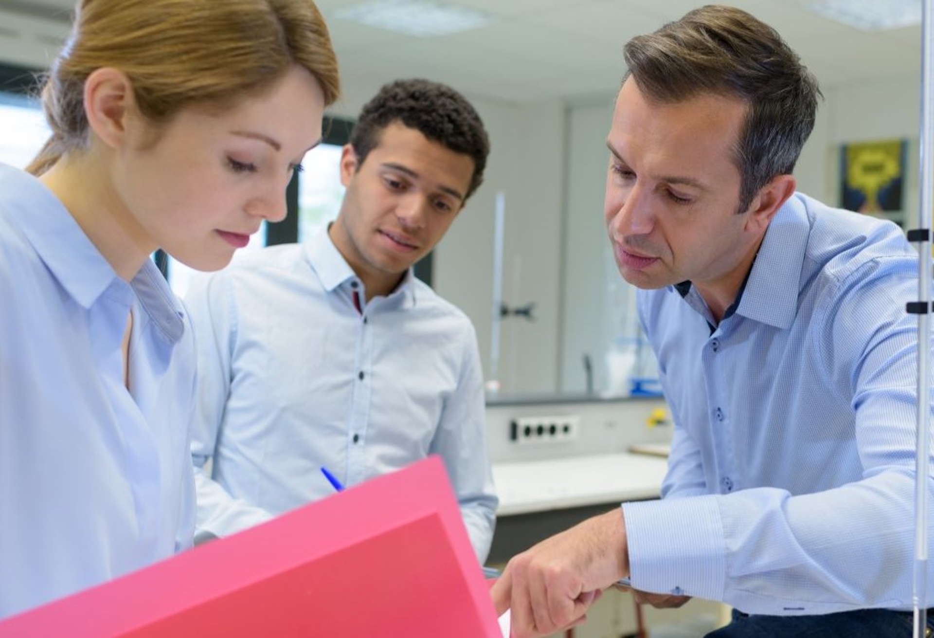 Idox Lilie Sexual Health Software Patient Communications Module Three Clinical Team Members Reviewing Documents