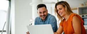 Idox_CasparLaw_Male_and_Female_at_laptop