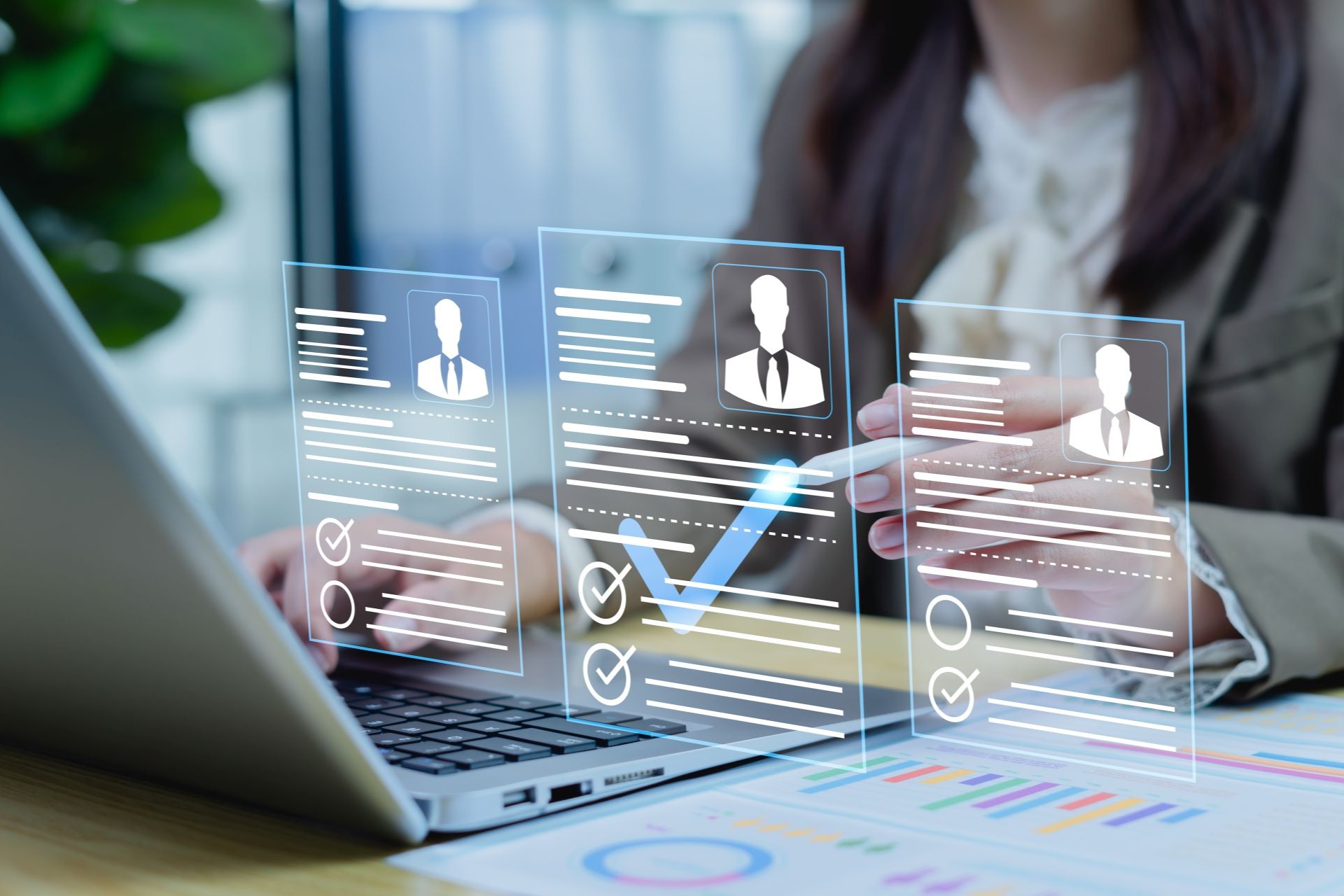 Idox_Engage_WebAgent_Multi_Division_Manufacturers_Detailed_image_of_an_open_laptop_with Idox Engage customer communication platform displayed on laptop in office environment