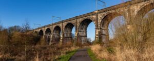 Viaduct (Nine Arches) in Merseyside with blue sky