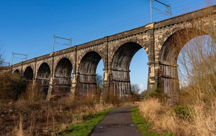 Viaduct (Nine Arches) in Merseyside with blue sky