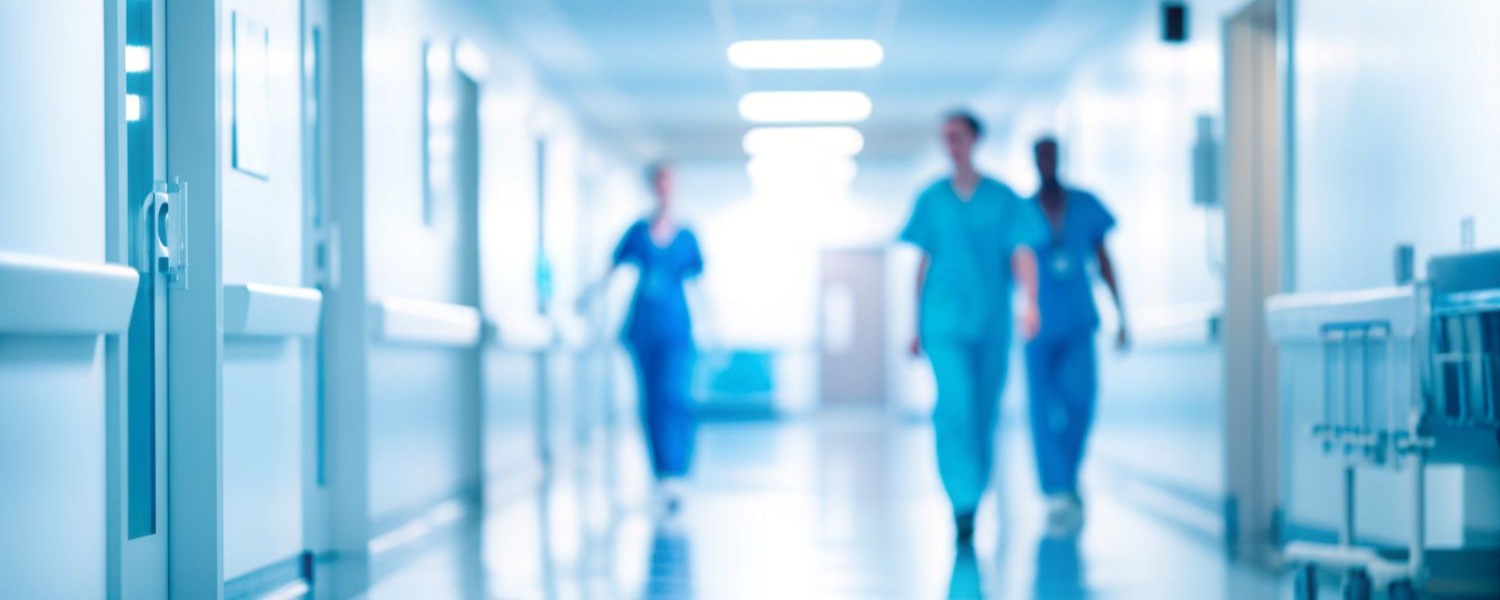 Hospital interior with medical equipment and healthcare staff