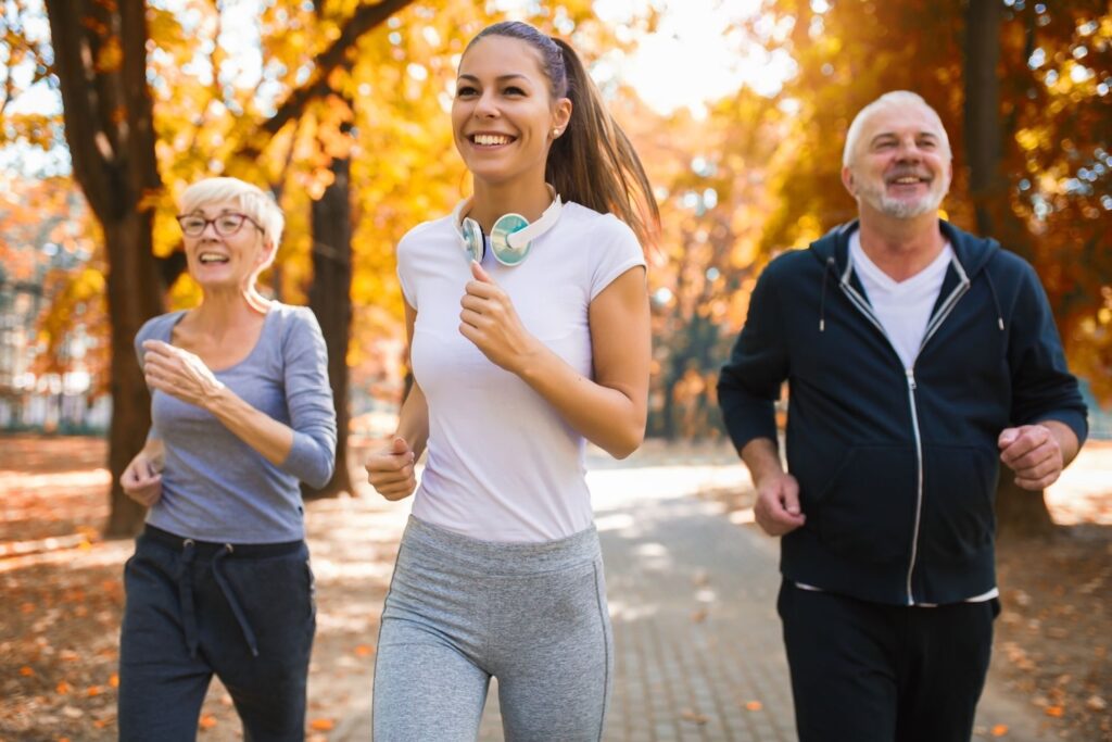 idox_directory_connect_neighbourhood_development idox directory connect multigenerational outdoor fitness group senior adults young instructor exercise health lifestyle